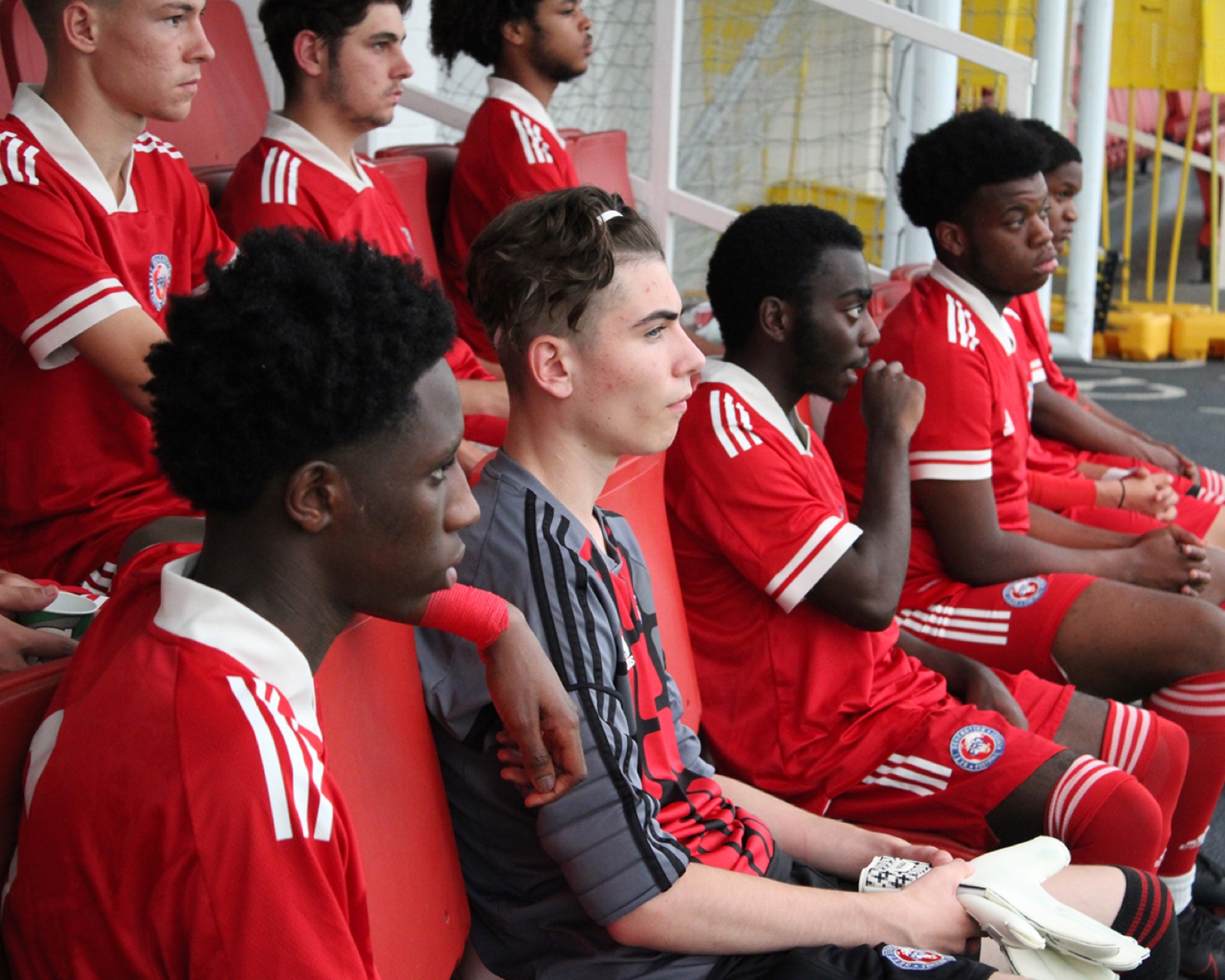 High-energy holiday camp drill with players celebrating a goal